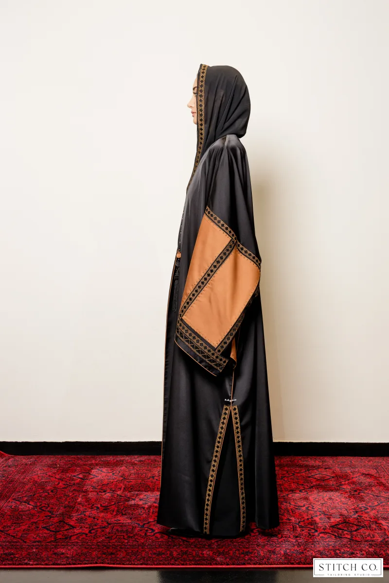 black embroidery  abaya with orange sleeves 